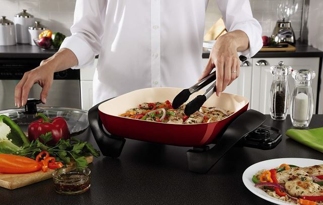 preparing food oster electric skillet image