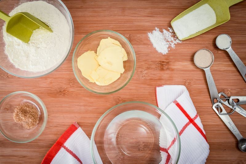 How to Make Pretzel Bread Step 1 Pretzel bread ingredients on a wooden board.