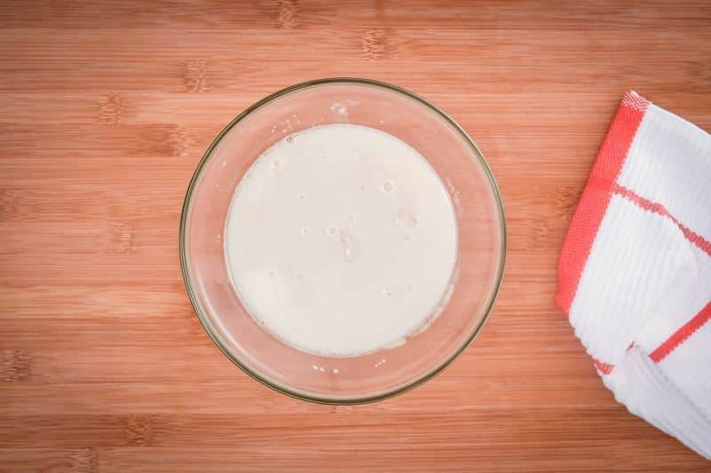 How to Make Pretzel Bread Step 2-4 Mixed water and yeast in a bowl.