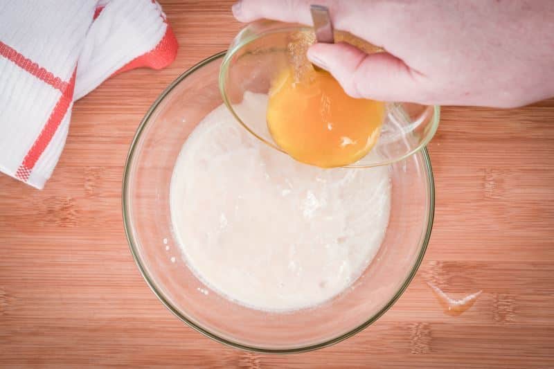 How to Make Pretzel Bread Step 4 Pouring butter mixture into pretzel dough.