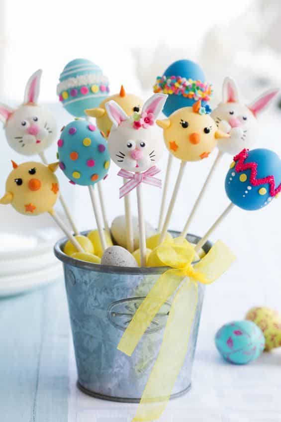 Cake pops for an Easter party Cute easter cake pops in a small decorative pail.