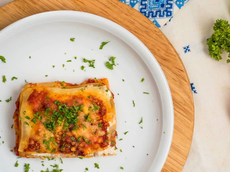 Electric Skillet Lasagna 3 - IntheKitch Piece of lasagna on a plate.