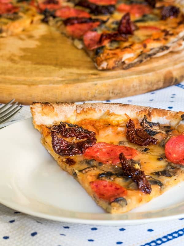 Electric Skillet Pizza 3 - IntheKitch Pizza on a serving board.