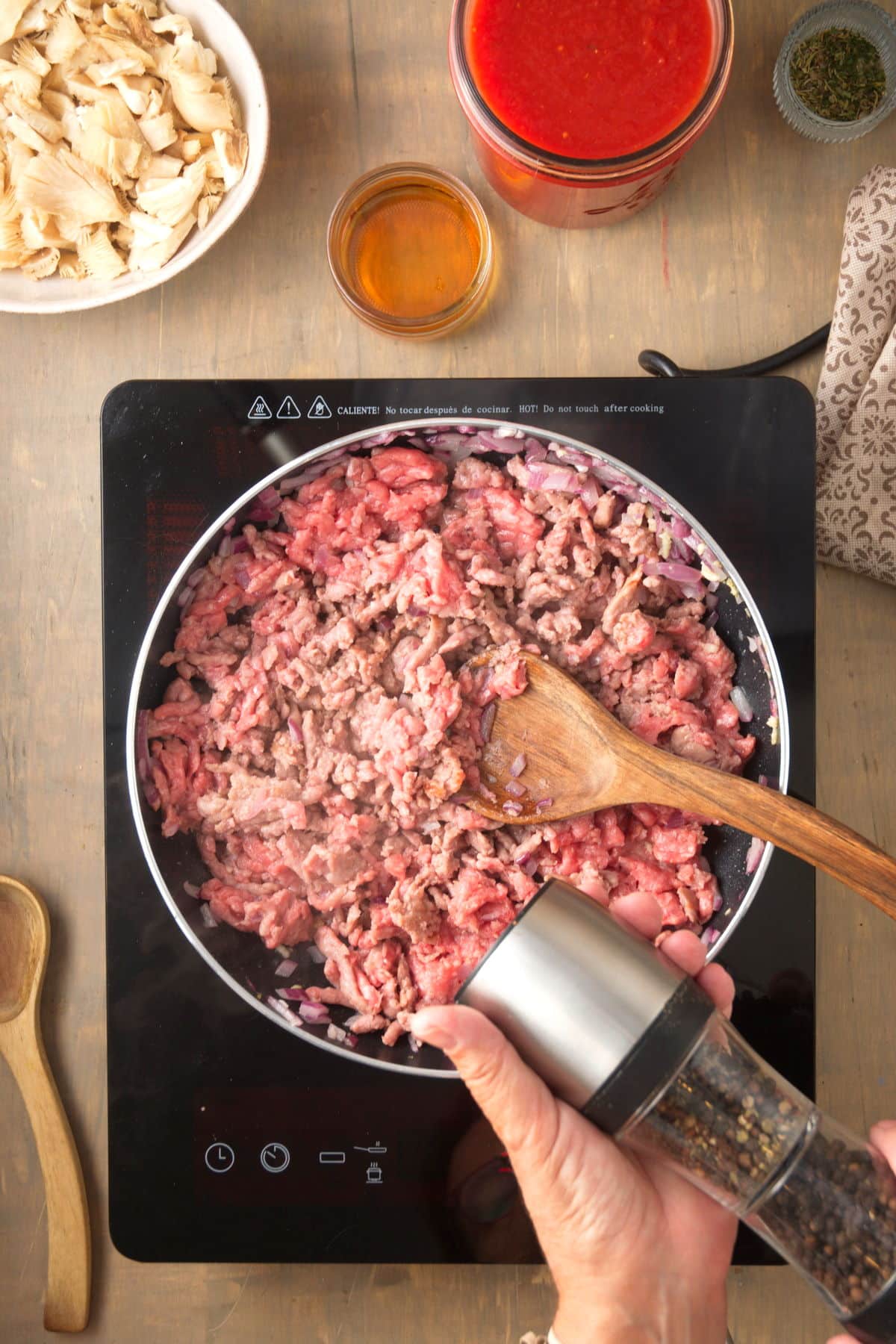 Bison ground meat in a pan.