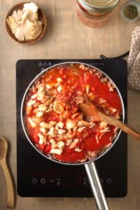Bison meat sauce with mushrooms in a pan.