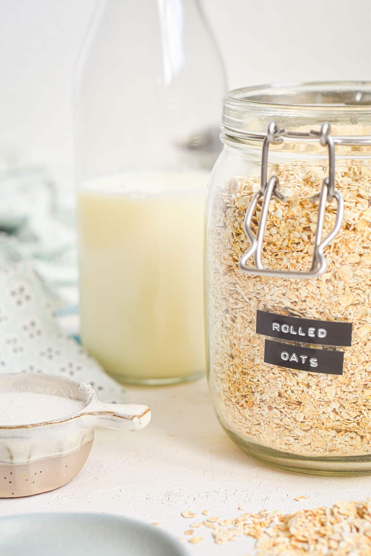 Rolled oats and milk in jars.