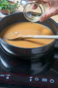 Brown gravy in frying pan.