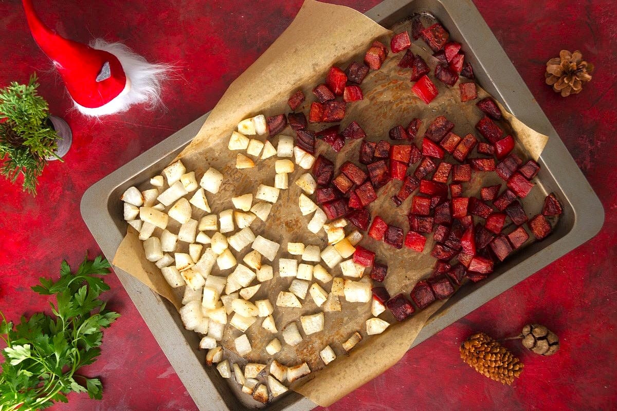 Roasted beets and turnips on a baking sheet.