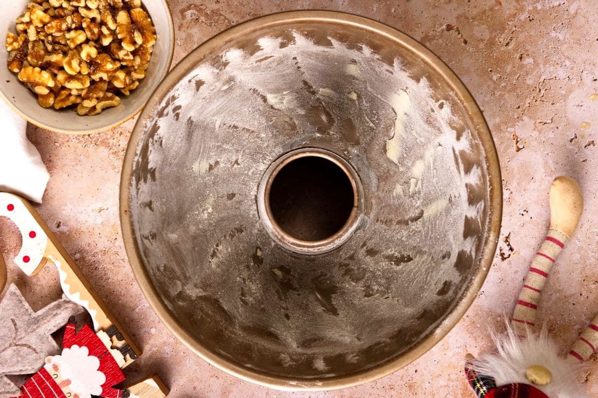 Bundt cake pan that has been buttered.