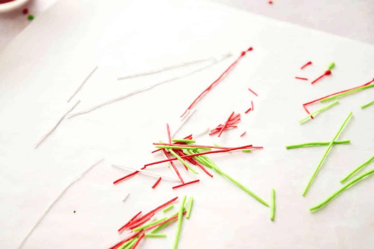 Christmas candy sprinkles on wax paper.