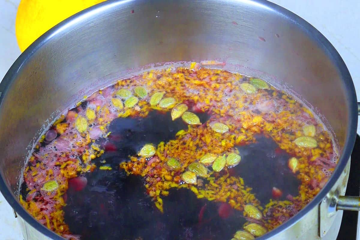 Swedish Glögg simmering in pot.
