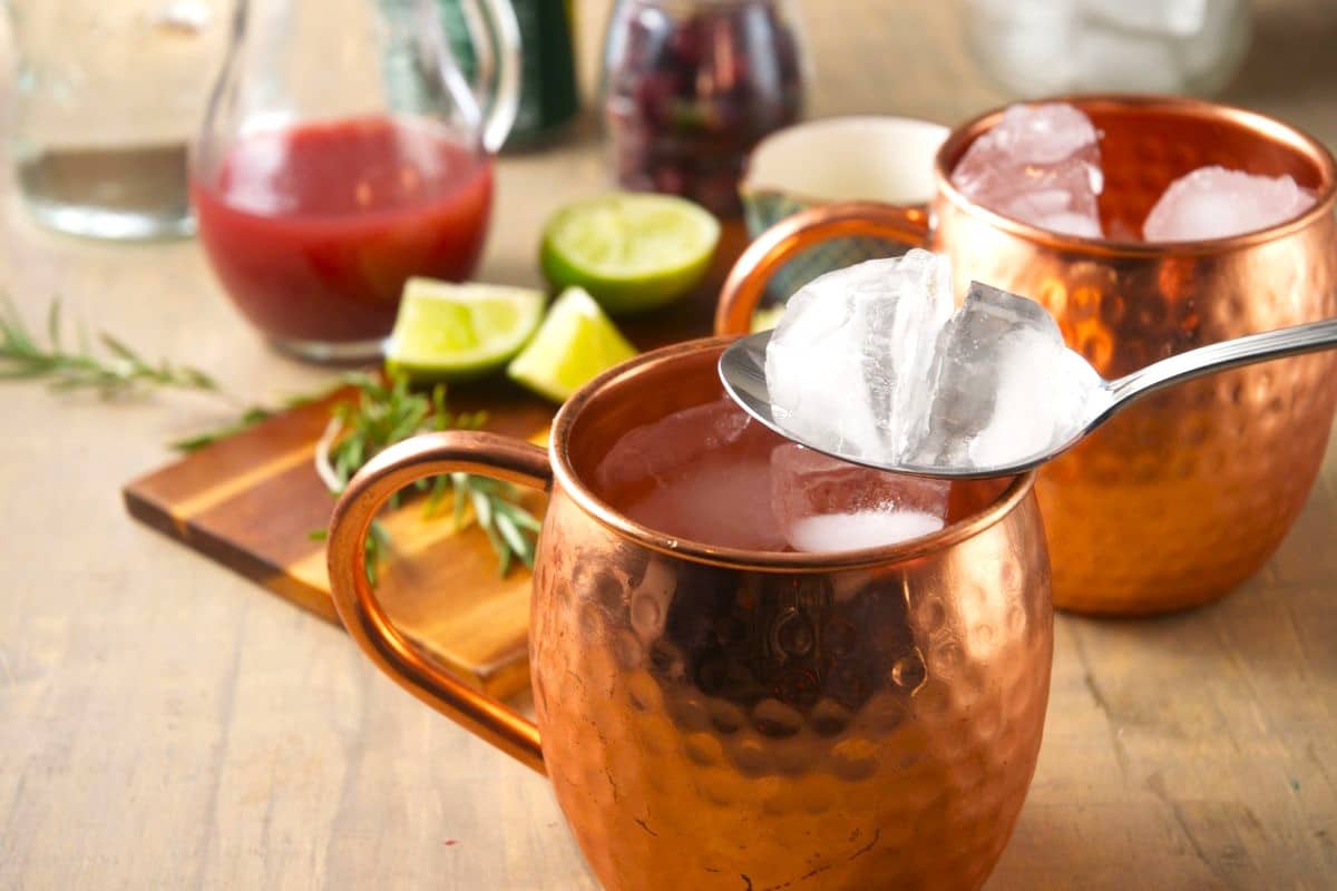 Ice in copper mug.