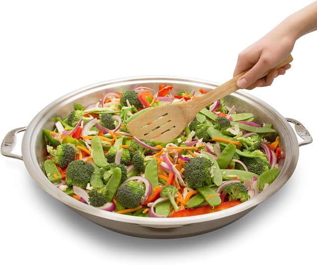 Cucina Pro Stainless Steel Electric Skillet with food in it.