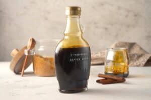 Gingerbread syrup in a jar with the label 'Gingerbread Coffee Syrup'.