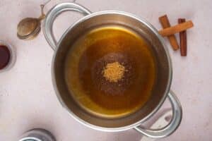 Gingerbread syrup ingredients in saucepan.