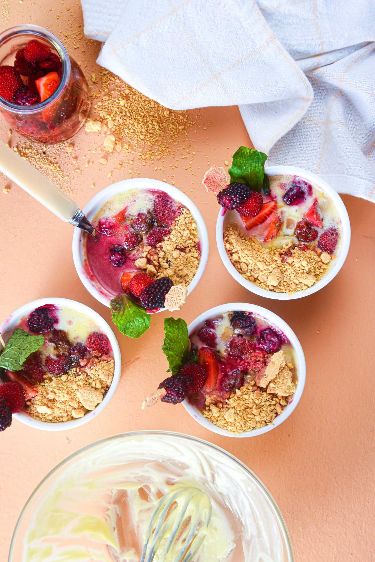 Electric skillet berries and cream dessert in small ramekins.