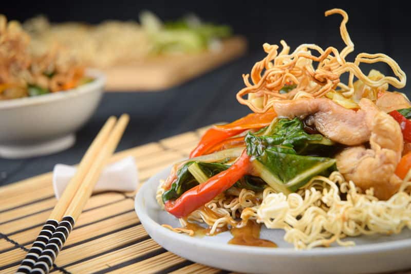Chow mein noodles Crunchy chow mein noodles with chopsticks.