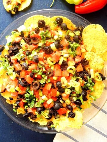 Veggie nachos on plate.