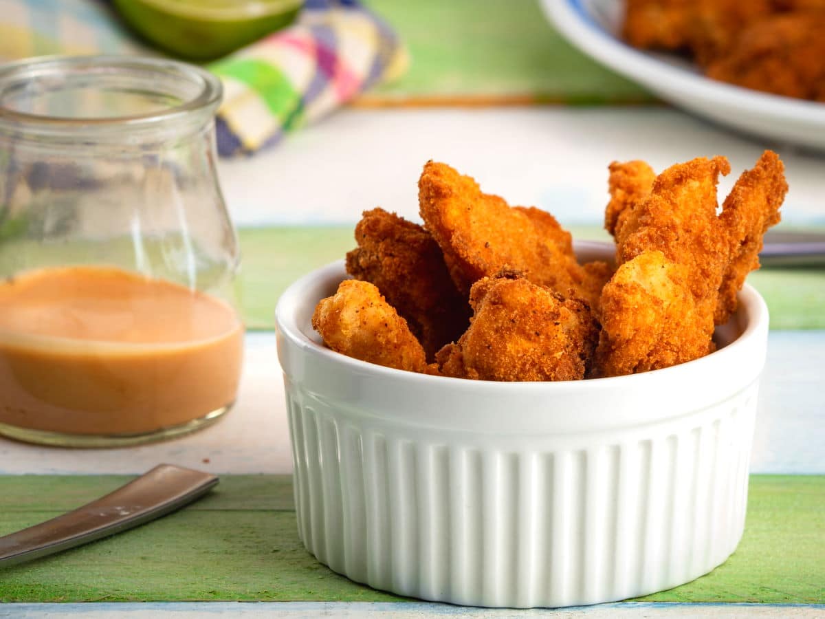 Fish Sticks with Sweet Mayo 1 Fish sticks in a white ramekin, dip on the side.