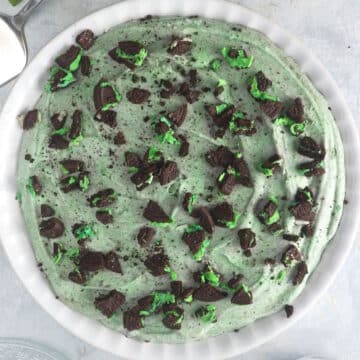 Grasshopper pie in white pie plate.