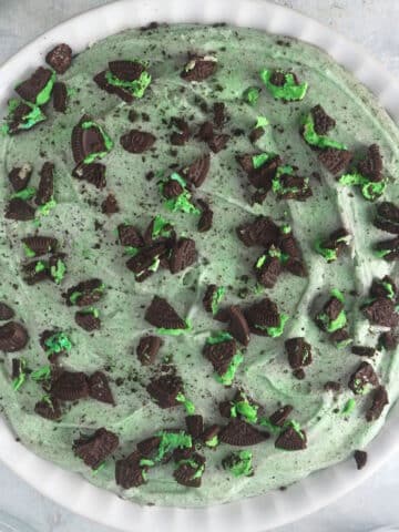 Grasshopper pie in white pie plate.