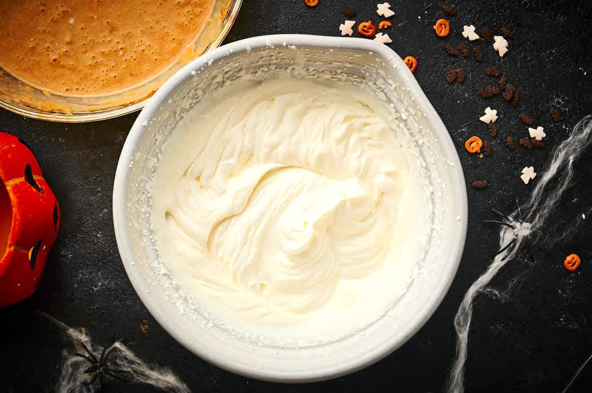 Whipped heavy cream in bowl.