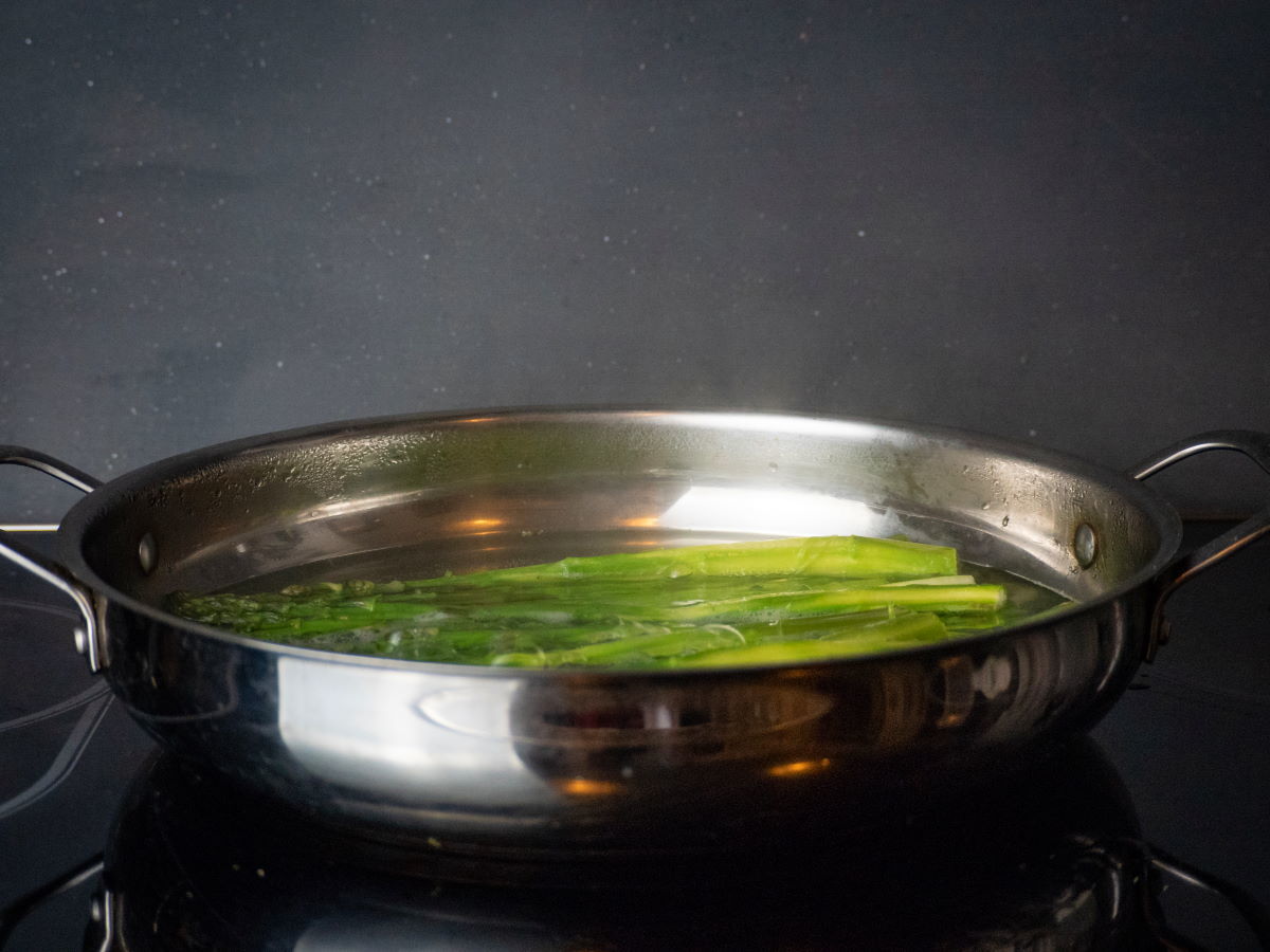 How to Cook Asparagus - Step 5 Asparagus cooking in frying pan.