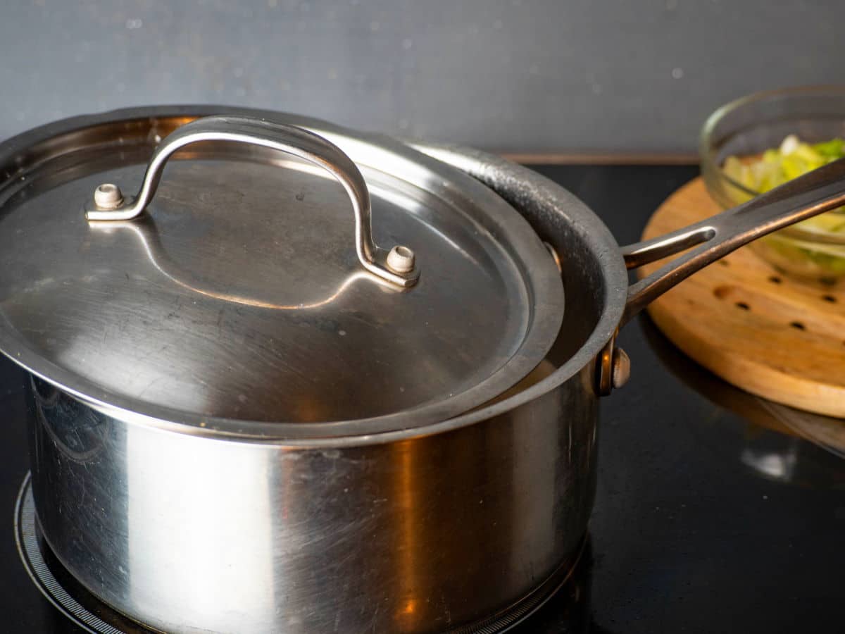 Pot on stove with lid.