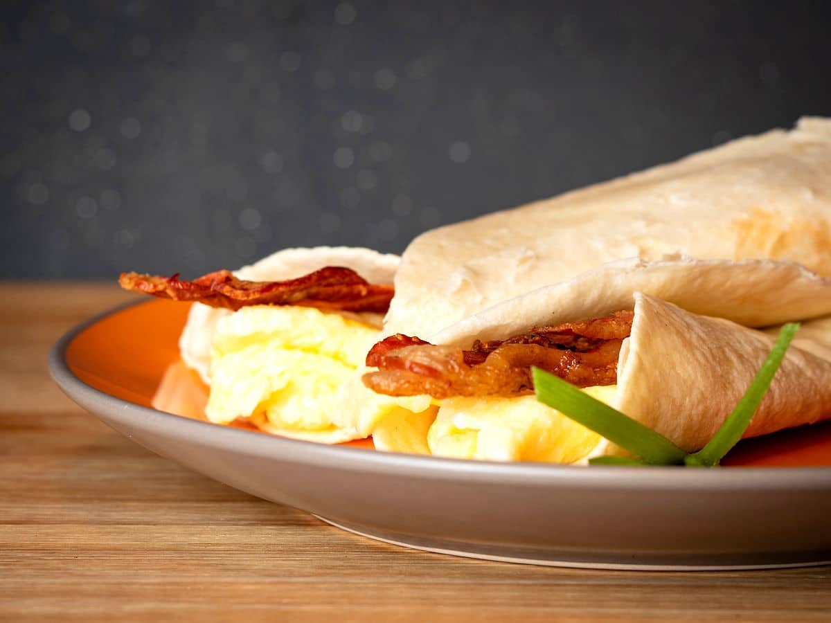 Crispy bacon wrap on plate.