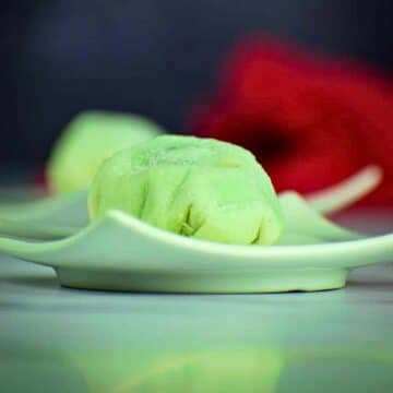 Mochi ice cream ball on small dish.