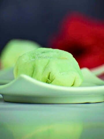 Mochi ice cream ball on small dish.