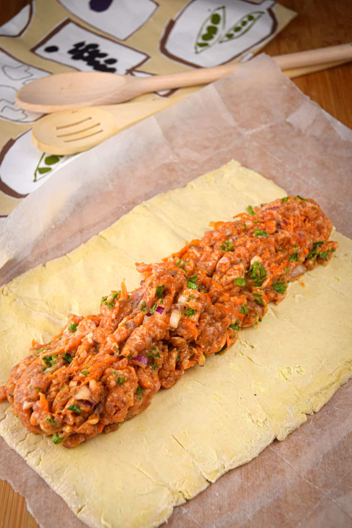 Puff pastry with sausage filling in the center.