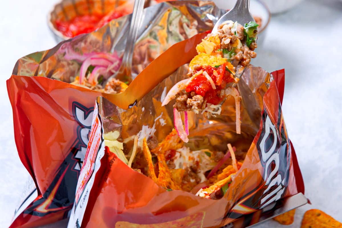Taco in a bag with forks.