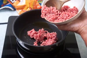 Ground beef in a pan.