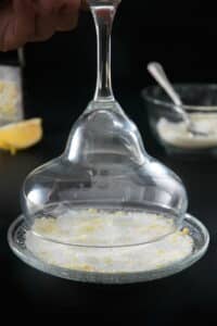 Martini glass dipped into sugar rim.