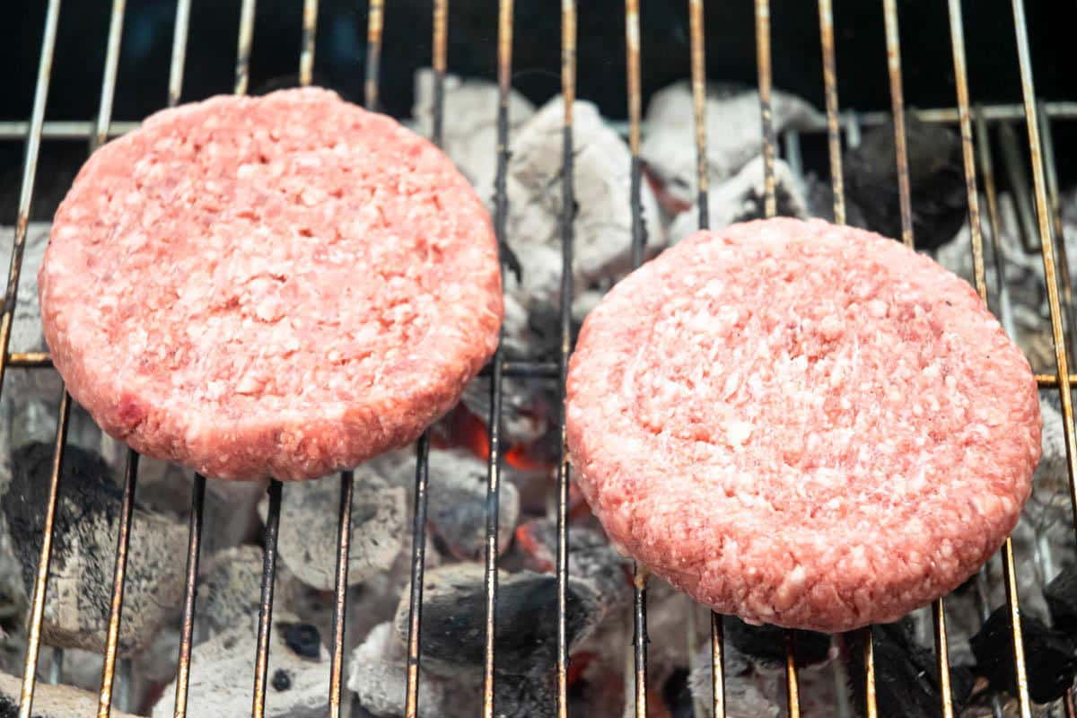 Burger patties on the grill.