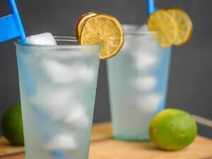 Candied limes as a garnish on cups.