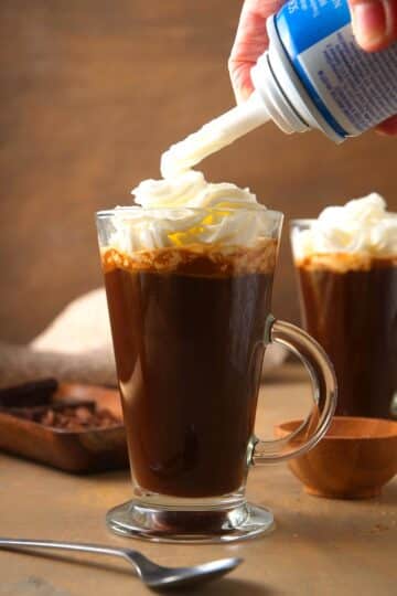 Irish coffee with whipped cream on top.