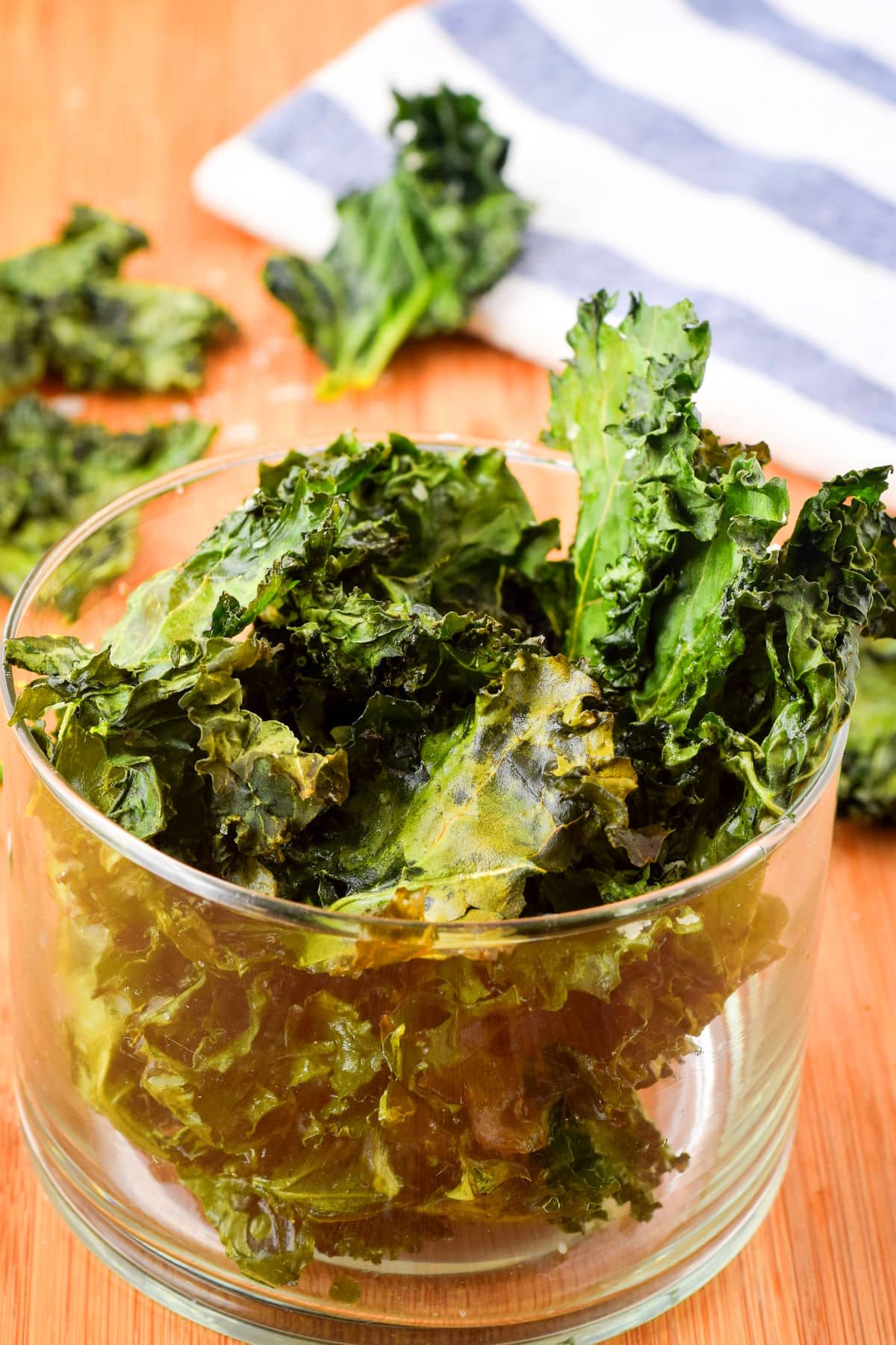 Kale chips in glass container.