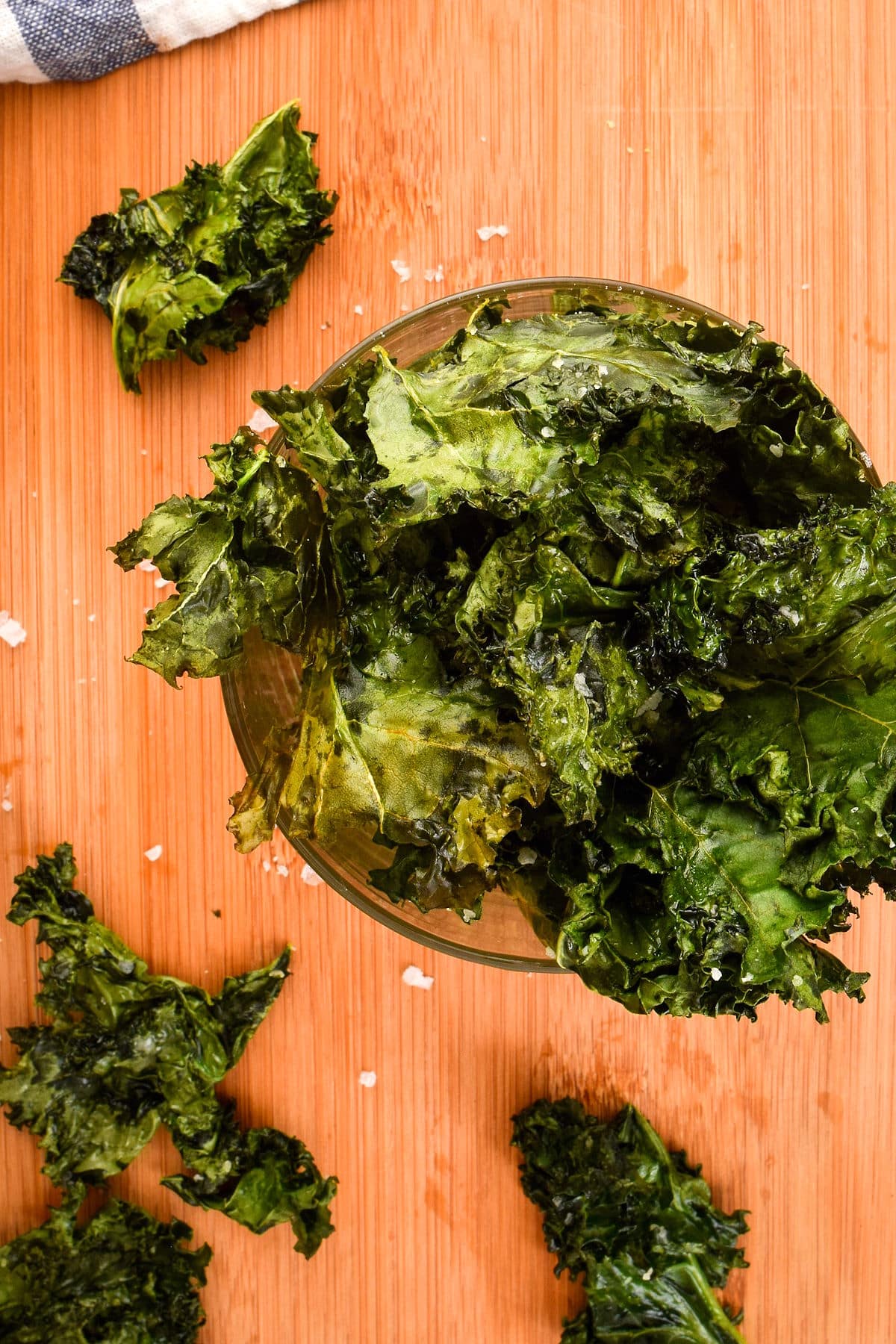 Kale chips in glass container.