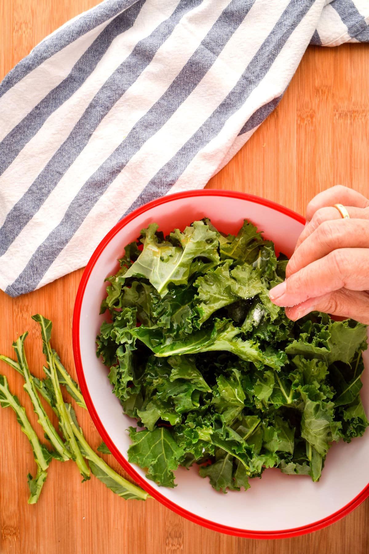 Kale in bowl with salt.