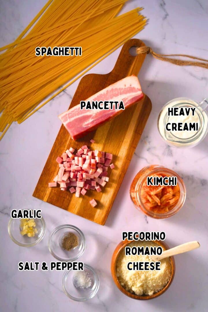 Kimchi carbonara ingredients prepped and labeled.
