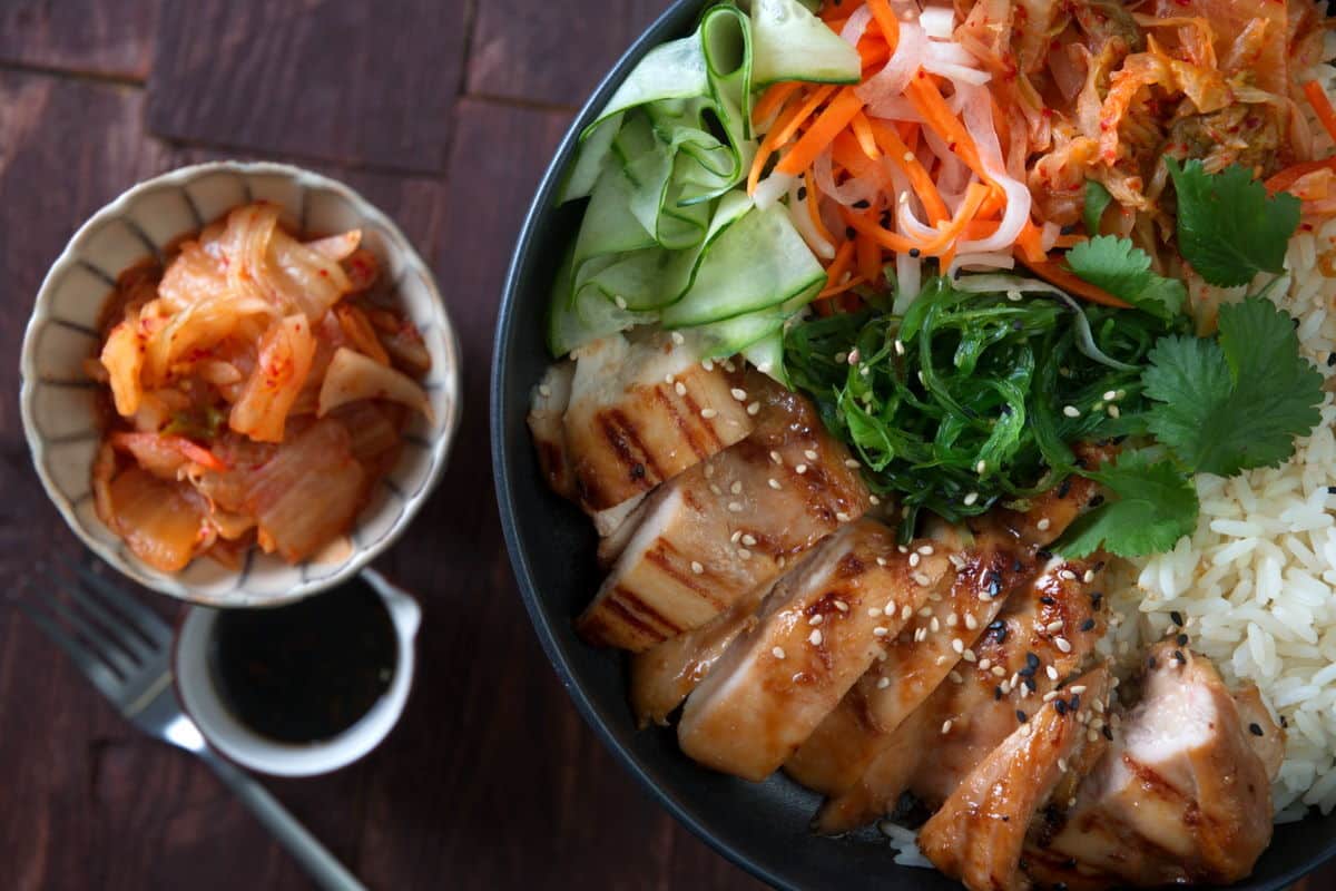 Kimchi rice bowl on wooden background.