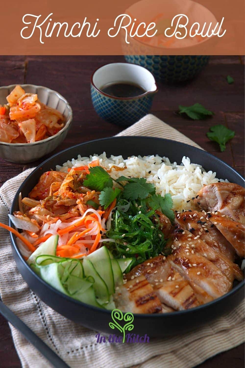 Kimchi and chicken rice bowl with text overlay that says 'kimchi rice bowl.