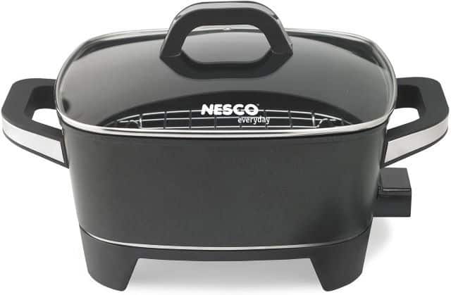 Nesco deep electric skillet on white background.