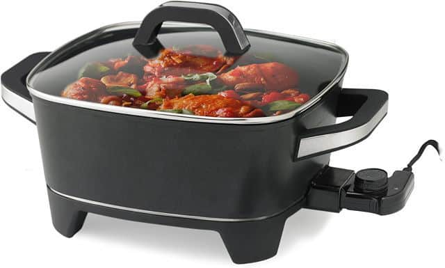 Nesco Deep Electric Skillet 2 Nesco deep electric skillet on white background.