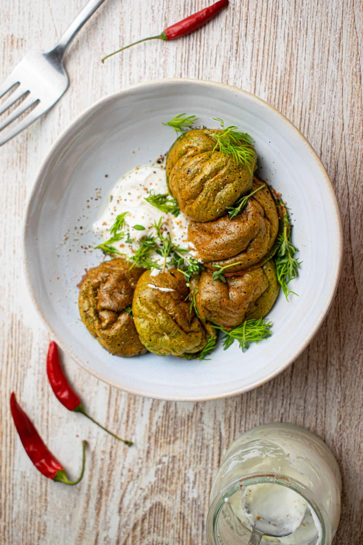 Spinach egg bites on a white plate.