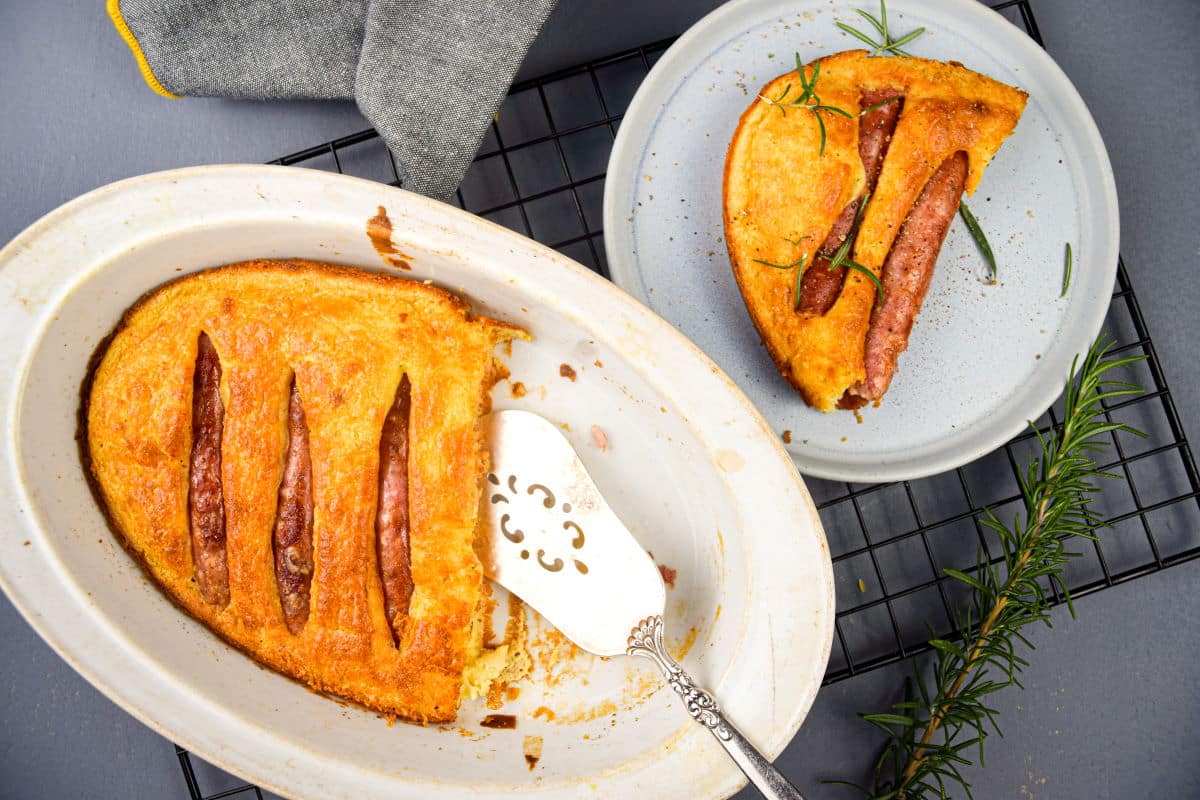 Toad in the hole in a casserole dish and on a plate.