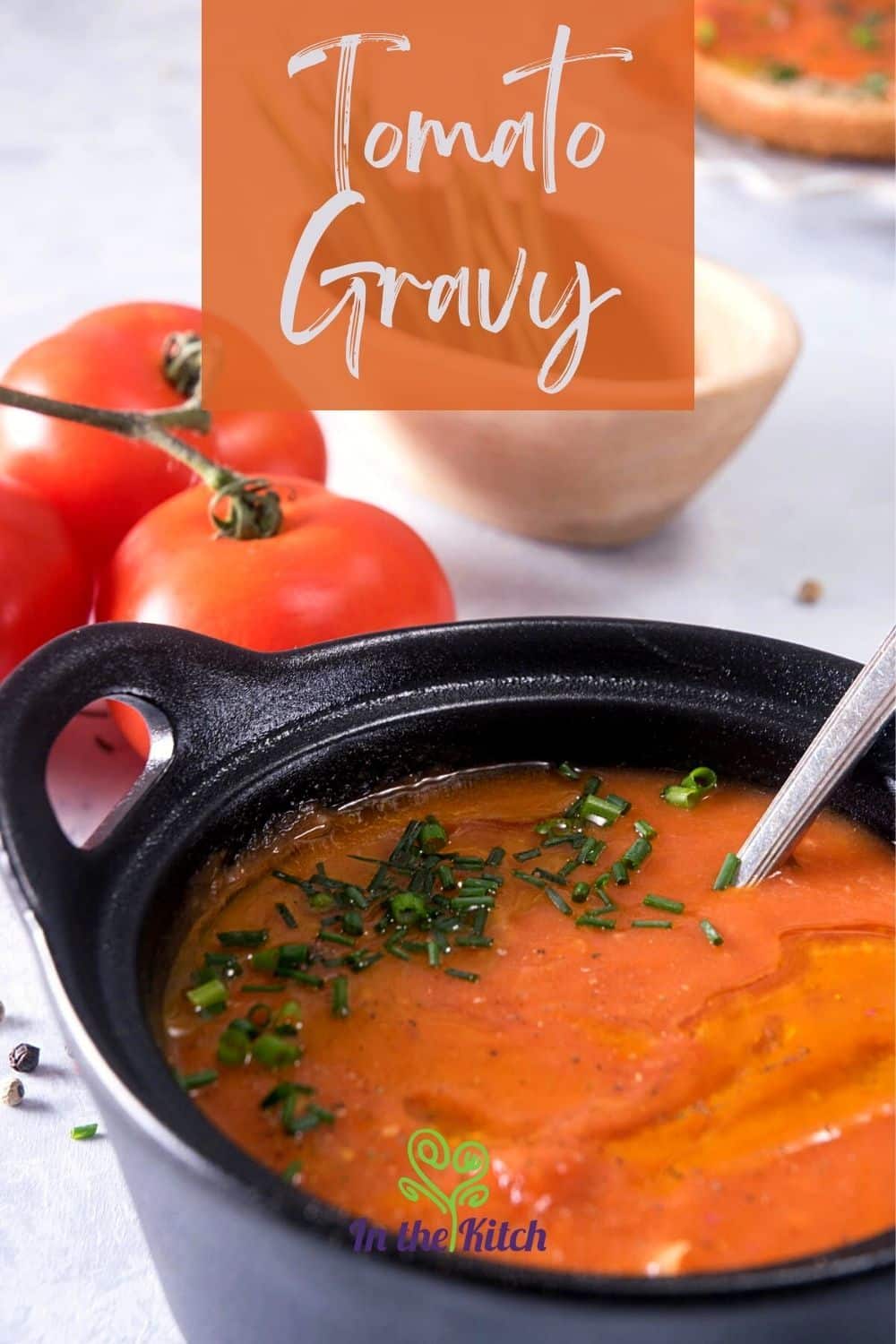 Tomato gravy in bowl with text overlay that says 'Tomato Gravy'.