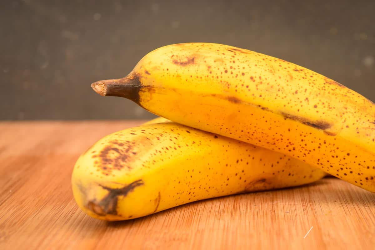 How to Make Banana Ice Cream Step 1 Bananas on a cutting board.